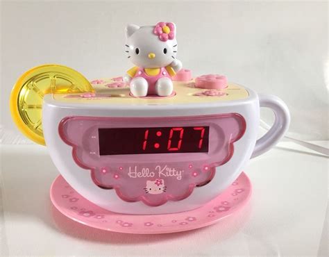 Model Tea Cup Clock Radio Hello Kitty KT2055 - Hello Kitty Brand, Sanrio. . Hello kitty teacup alarm clock